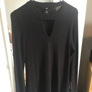 Black cutout sweater dress.